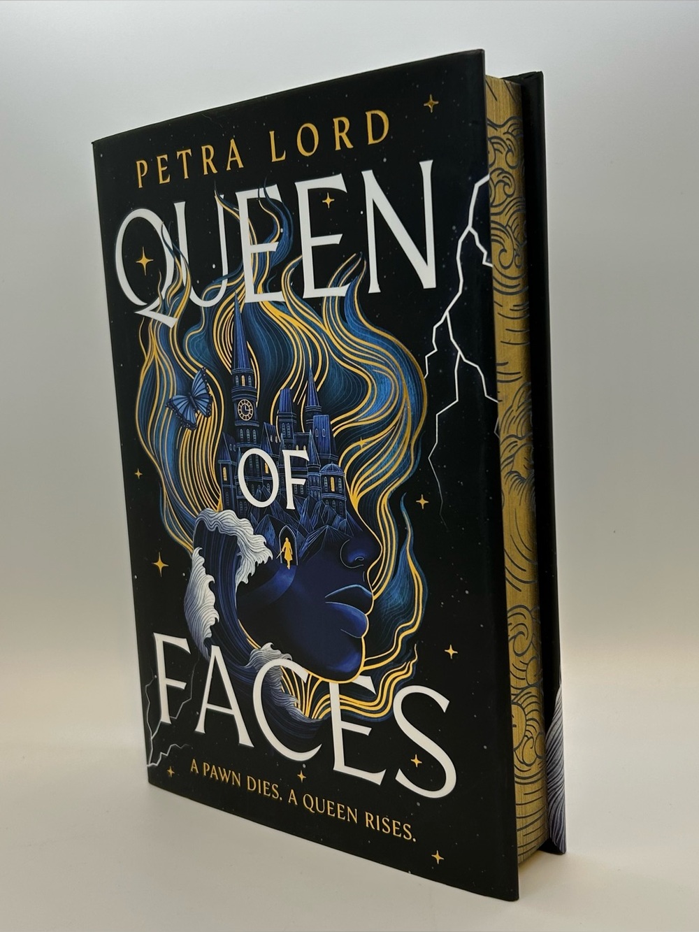 Queen of Faces Petra Lord Fantasy 1st Edition 2026 HB Book Sprayed Edges Guilded